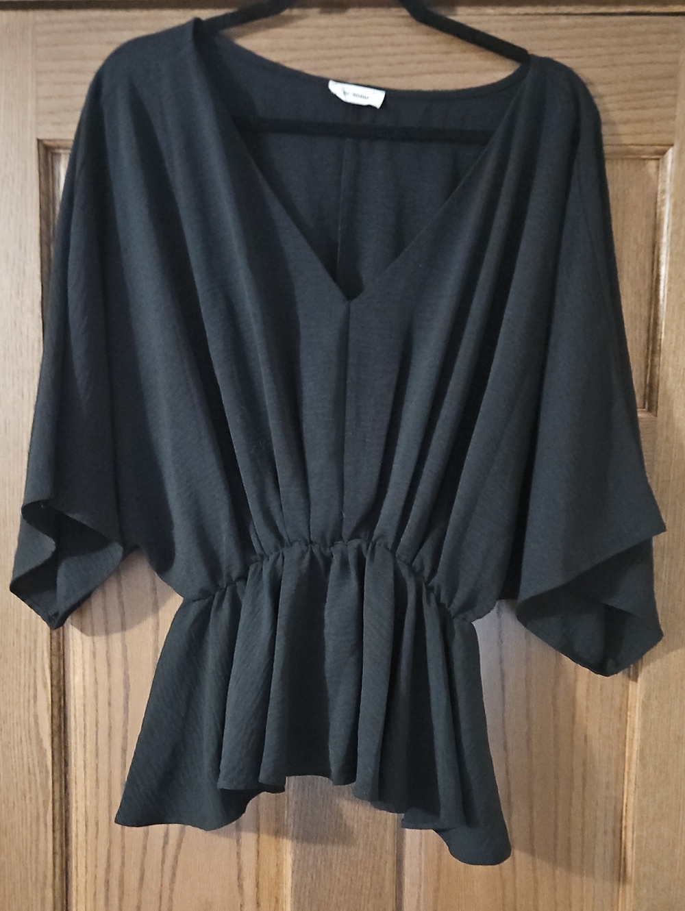 eesome Black V-Neck Ruched Peplum Blouse